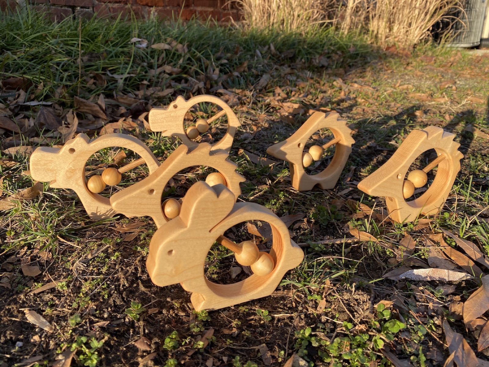 A collection of wooden rattles in the woodshop